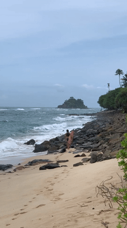Early morning surfing activity observed at Midigama Beach, Sri Lanka