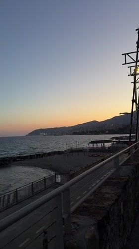 Evening coastal scenes captured along Sanremo waterfront promenade