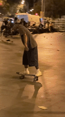 Late-night skate tricks in a Barcelona plaza