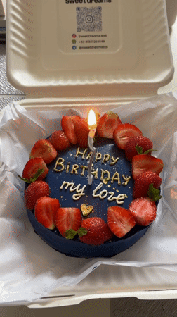 Birthday cake with romantic message photographed in Kuta Selatan