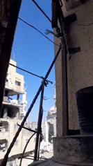 Everyday moments documented in Khan Yunis amid damaged cityscape