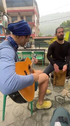 Early morning street musicians perform in Pokhara, Nepal