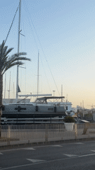 Ibiza at golden hour: marina, mountains, and a fading sun