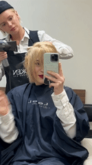 Woman gets manicure at Budva nail salon, samples pink polish