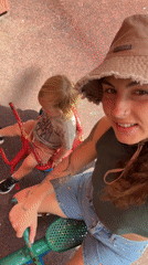 Woman films playground selfie with child, dog in Kiryat Motzkin