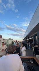 Rooftop DJ performance draws crowd in Kazan at sunset