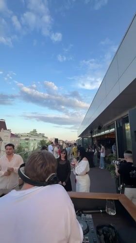 Rooftop DJ performance draws crowd in Kazan at sunset