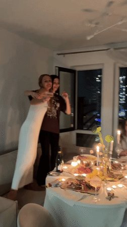 Women celebrate birthday with candlelit party in Khimki apartment