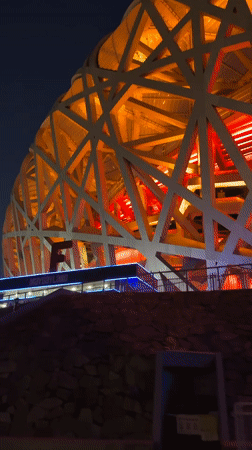 Night tour captures illuminated Beijing Olympic Park landmarks