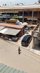 Overhead street scene documented in Nigerian commercial district