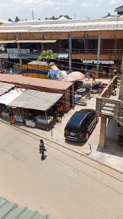 Overhead street scene documented in Nigerian commercial district
