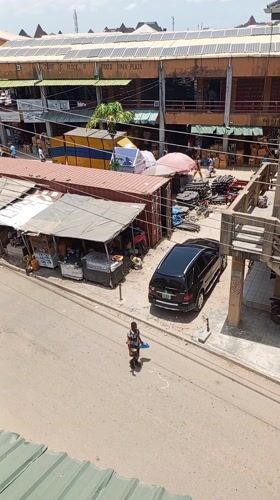 Overhead street scene documented in Nigerian commercial district