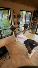 Man performs morning workout routine in Jos home gym