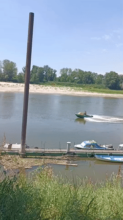 Summer afternoon activities along Po River in Guastalla