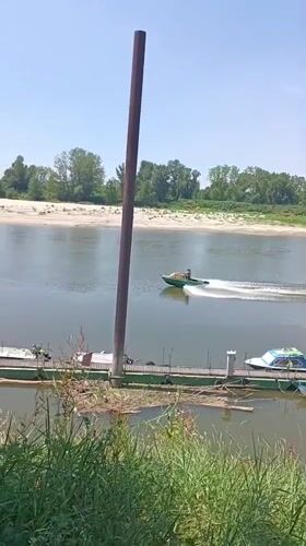 Summer afternoon activities along Po River in Guastalla