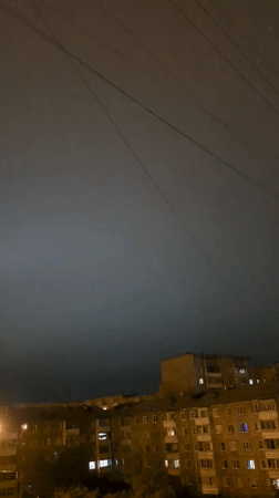 Thunderstorm lights up Irkutsk apartment blocks on a rainy night