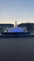 Colorful fountain display draws observers in Chaikovsky public square