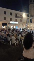 Live music fills a Viadana town square on a summer night