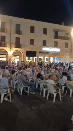 Live music fills a Viadana town square on a summer night
