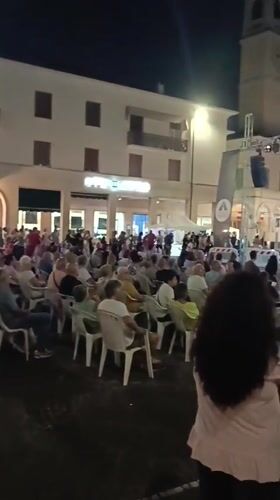 Live music fills a Viadana town square on a summer night