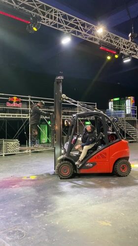 Event setup underway across multiple Belgrade venues with industrial equipment
