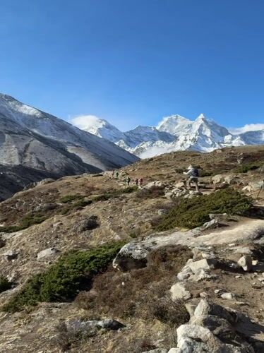 Trekkers Navigate Rocky Himalayan Trails in Nepal's Khumjung Region