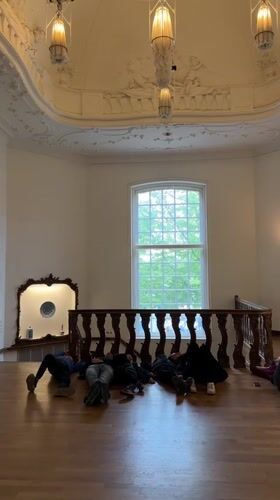Museum visitors explore Rijksmuseum galleries and exhibits in Amsterdam