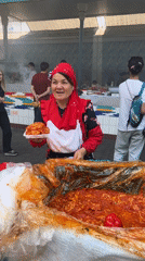 Tashkent market bustles with vendors and diners on sunny morning