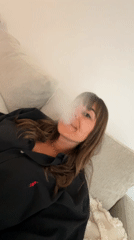 Woman relaxing, vaping at home meal in Cannes