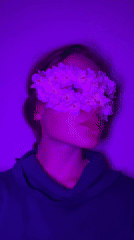 Woman photographed in floral eye masks during Budva art session