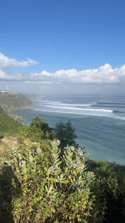 Calm coastline and green cliffs in Kuta Selatan, Bali