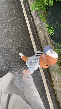 Family documents casual morning walk and child's play in Sochi