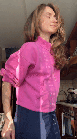 Woman enjoys afternoon dance session at home in Kryvyi Rih