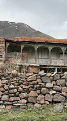 Visitor documents crumbling ruins in remote Georgian village