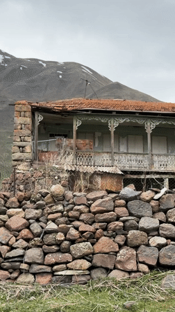 Visitor documents crumbling ruins in remote Georgian village