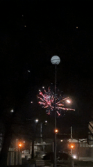 Nighttime fireworks display illuminates Karlovo, Bulgaria streets