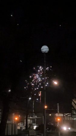 Nighttime fireworks display illuminates Karlovo, Bulgaria streets
