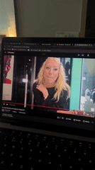 Seoul resident watches fashion videos on laptop early morning