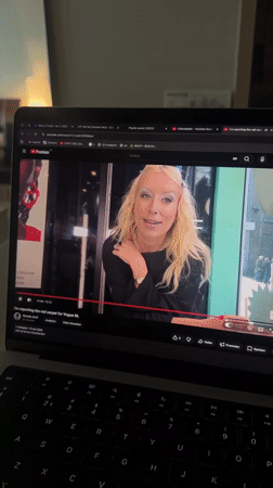 Seoul resident watches fashion videos on laptop early morning
