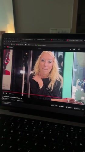 Seoul resident watches fashion videos on laptop early morning