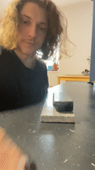 Fingerboard tricks and dog moments captured in Yekaterinburg home