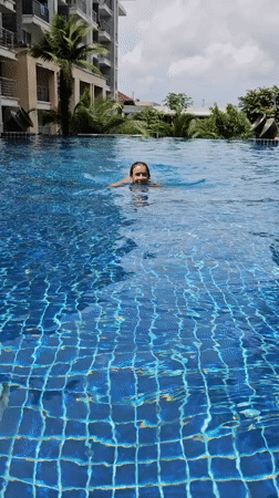 Lazy poolside morning in Phuket with fruit and water