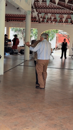 Baby plays with toy during evening in Cuautla, Mexico