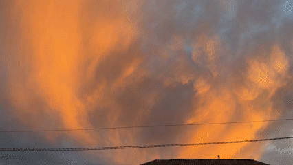Sunset over Agachaul's hilly outskirts amid active construction
