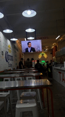 Late-night diners gather at Mexico City taqueria watching telenovelas