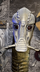 Predator, C-3PO, and horror collectibles on display