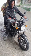 Daily life unfolds in Old Manali tourist district