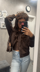 Woman takes mirror selfies showing blue manicure in Moscow region