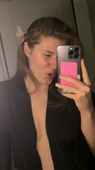 Woman takes selfie in dressing room in Kazan
