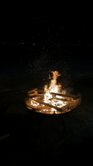 Evening beach gathering with bonfire documented in Votkinsk